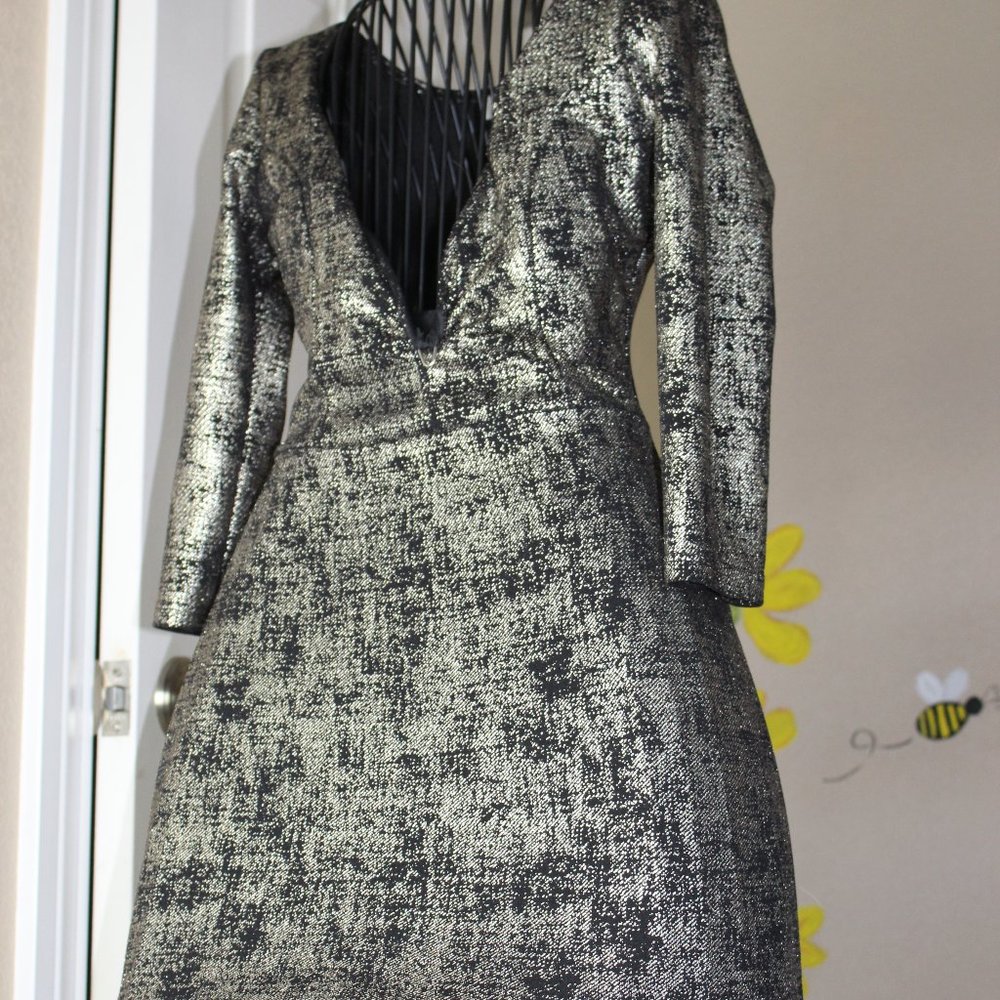 black and gold speckled low cut dress